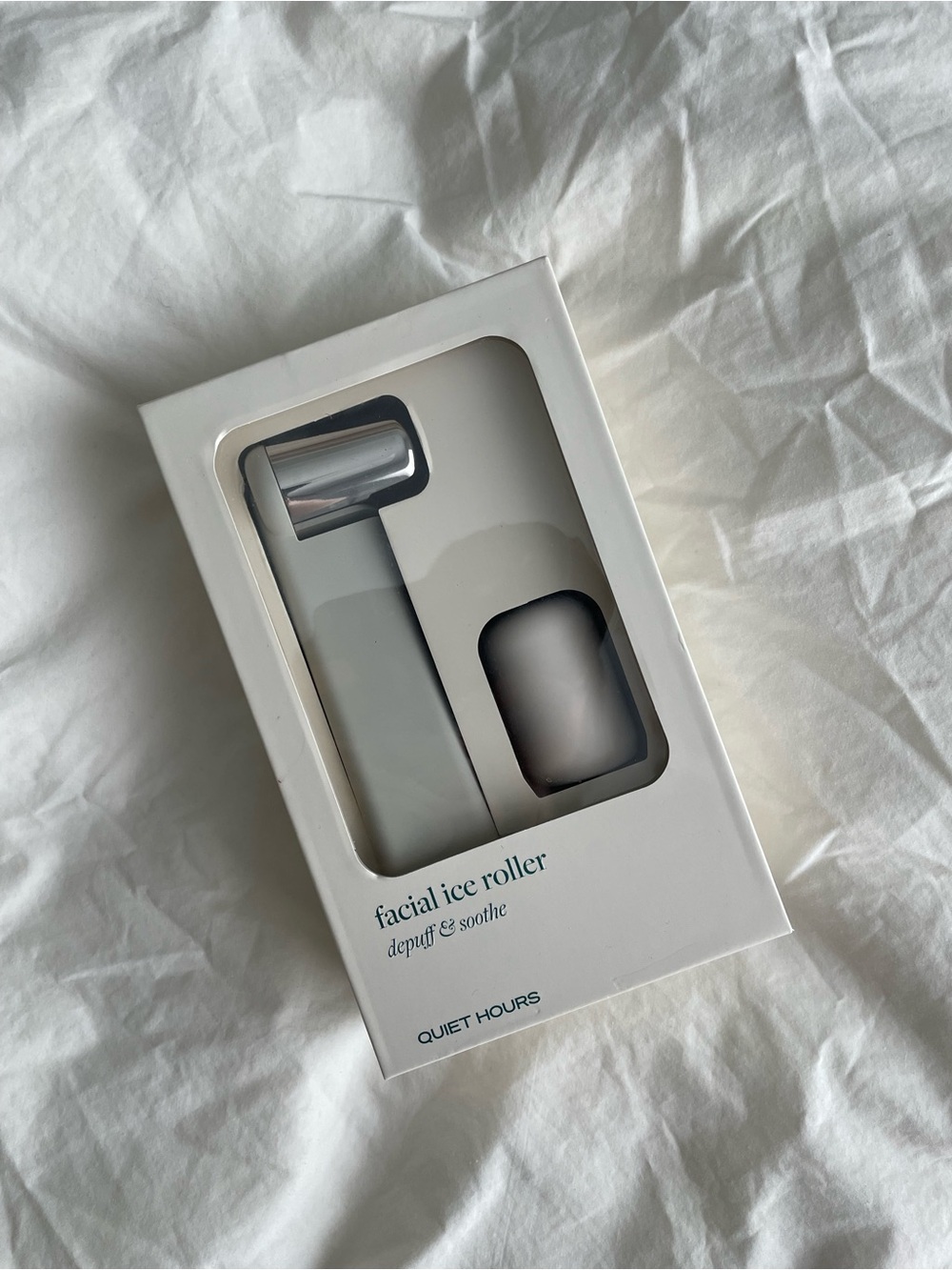Quiet Hours Facial Ice Roller in Silver and White